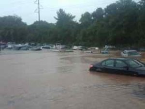 Flooded Park and Ride lot in Reston. [In the Restonian via Twitter]